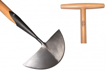 De wit gesmede graskantsteker